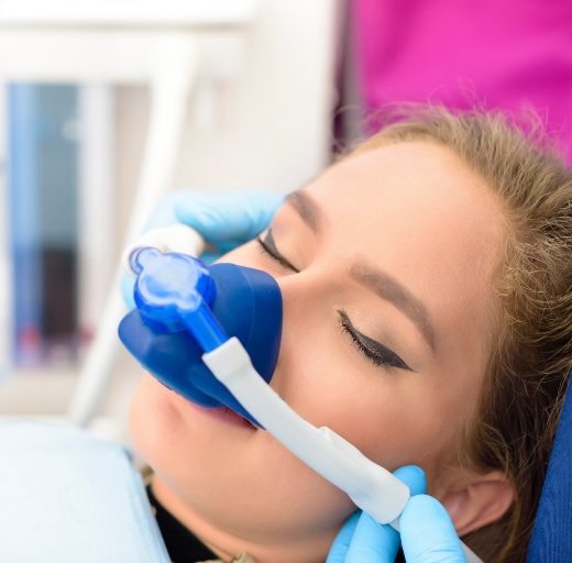 Woman taking an oral conscious dental sedation